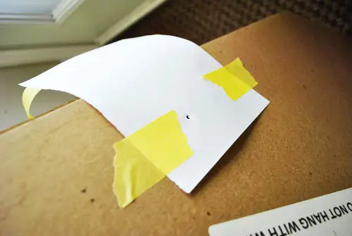Spiegelpapier op de achterkant geplakt