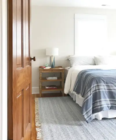 Strandhuis keuken voorslaapkamer met vloerkleed