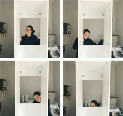sherry maakt een reeks gezichten in het gat aan de achterkant van de pax-kledingkast