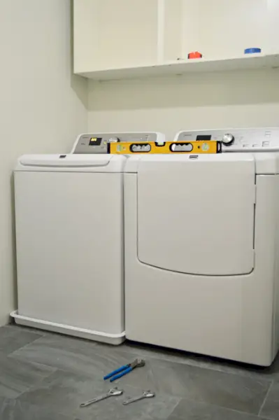 WasherIn 6 Waterpas stellen