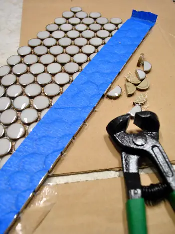 „TileStart“ mėlynos juostos pjovimas