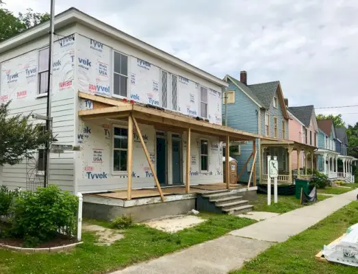 Duplex huidige staat met gevelbeplating