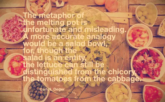 A large bowl of salad greens and several small bowls of chicory, cabbage, and mushroom