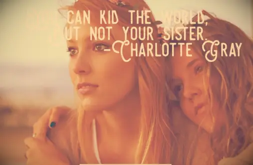 A younger sister leans on her older sister