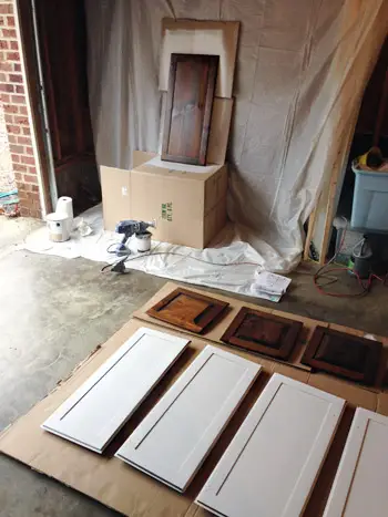 WhiteCabs spuiten in garage
