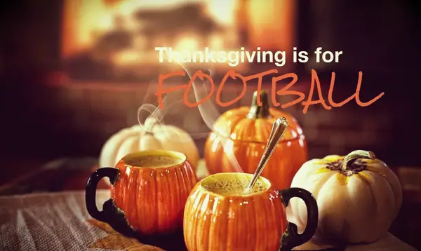 Steam rising from coffee served in two pumpkin-shaped cups