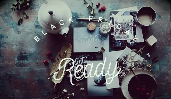 Trinkets and a tea pot arranged on a worn table