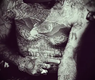 A tattoo on a lead singer