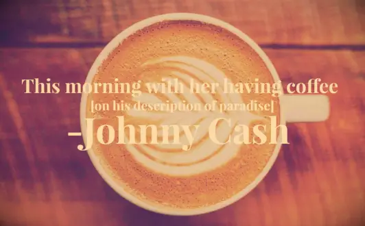 A flat white with a thistle pattern in its foam at Filament Coffee in Edinburgh